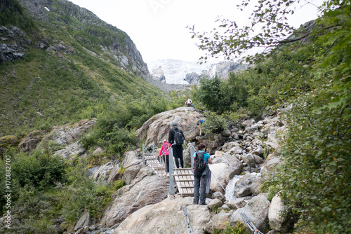 People go to Buer glacier, Norway © Raimond Klavins