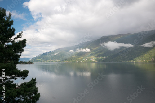 Clouds and water view on the narrowest fjord in Norway