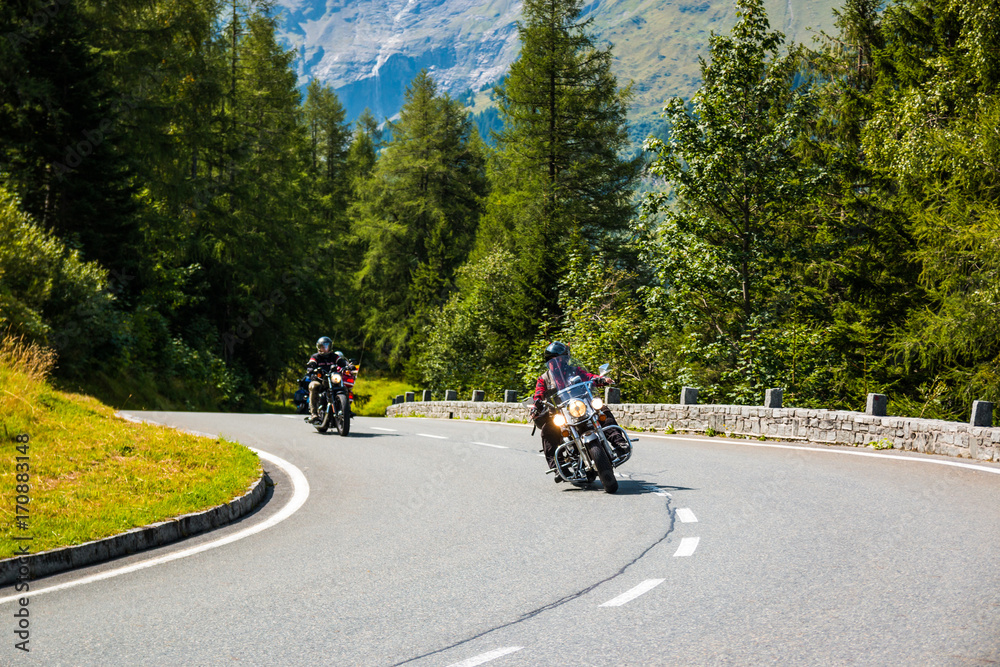 Motorcycle on Country road to Grossglockner at the european alps, Austria Motorcycle on Country road to Grossglockner at the european alps, Austria