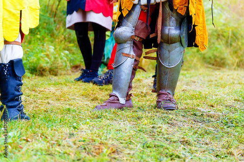 Medieval armor shoes on meadon. Detail shoes.