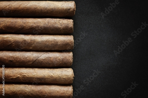 cigar on black background photo