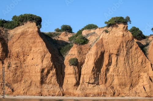 Effects of seaside coastal erosion with clayey soil
