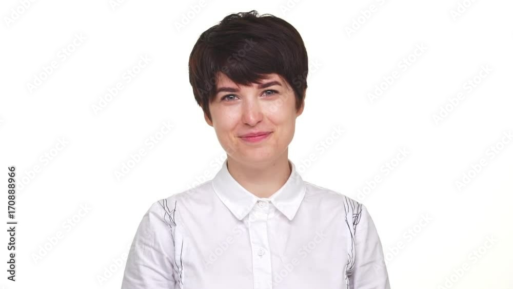 Caucasian bright nice woman laughing isolated over white background in slow motion. Concept of emotions Caucasian bright nice woman laughing isolated over white background in slow motion. Concept of emotions