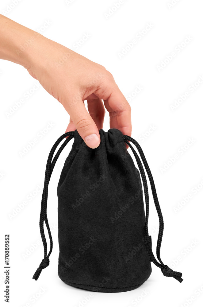 Black textile sack in hand isolated on white background Black textile sack in hand isolated on white background