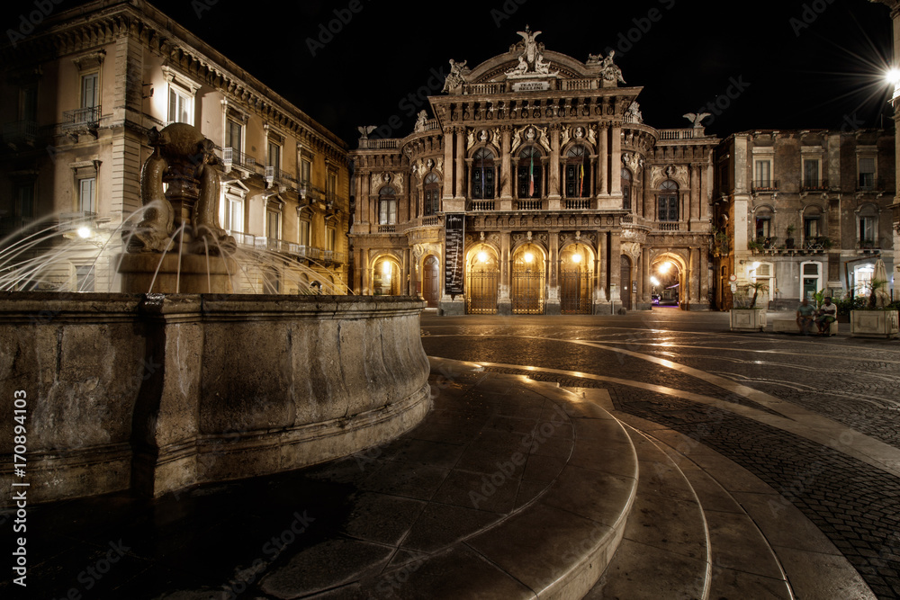 Fototapeta premium CATANIA, ITALY – theater and fountain on Piazza Vincenzo Bellini in Catania, Sicily, Italy. Teatro Massimo Bellini is an opera house, (Architect Carlo Sada 1880)