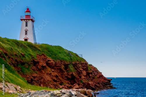 Lighthouse on the cliff at Souris, Prince Edward Island photo