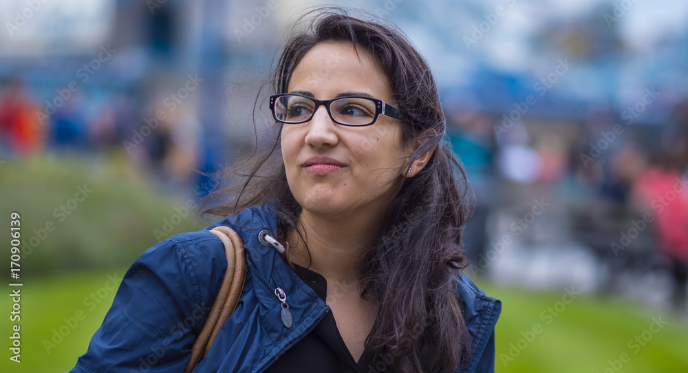 Young happy woman in the city