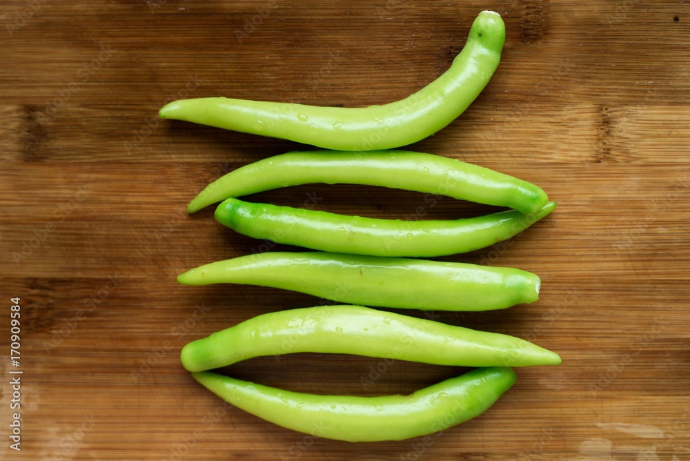 Green cucumber on wood background. Green cucumber on wood background.