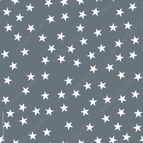 White stars seamless pattern on grey background. Great endless random scattered white stars festive pattern. Modern creative chaotic decor. Vector abstract illustration.