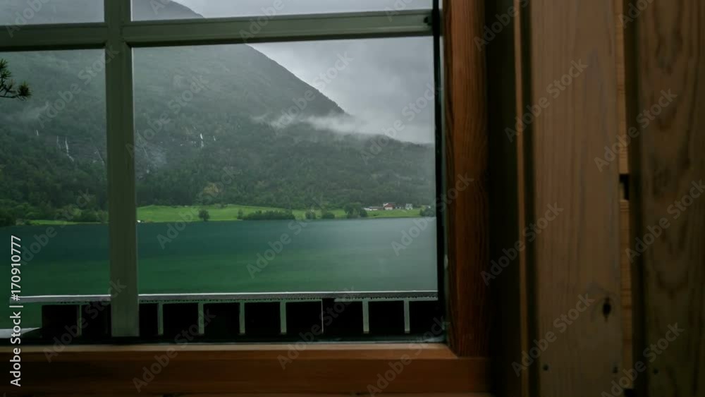 Time-laspe indoor of Mindresunde Camping Norway with view on Oppstrynsvatn Time-laspe indoor of Mindresunde Camping Norway with view on Oppstrynsvatn