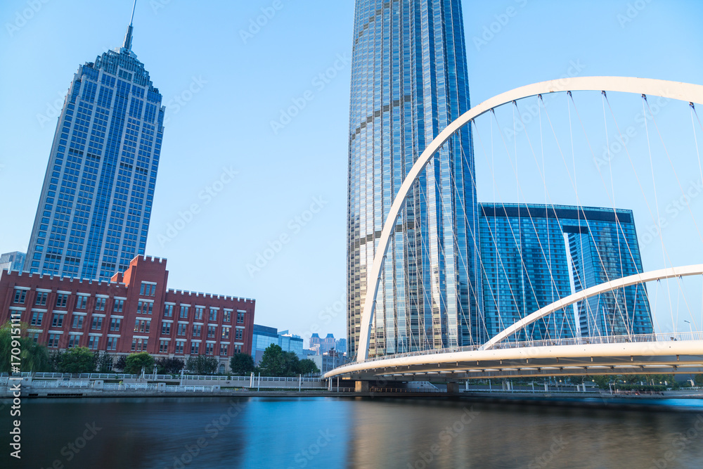 Tianjin Hai river waterfront downtown skyline with Dagu bridge,China. Tianjin Hai river waterfront downtown skyline with Dagu bridge,China.