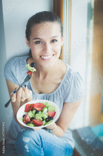 A beautiful girl eating healthy food. Beautiful girl