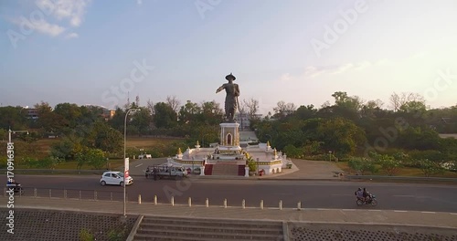 Chao Anouvong Statue On The Banks Of the Mekong River, Vientiane, Laos, Aerial Pullback Statue
 photo