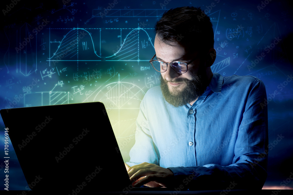 Businessman in the office at night Businessman in the office at night