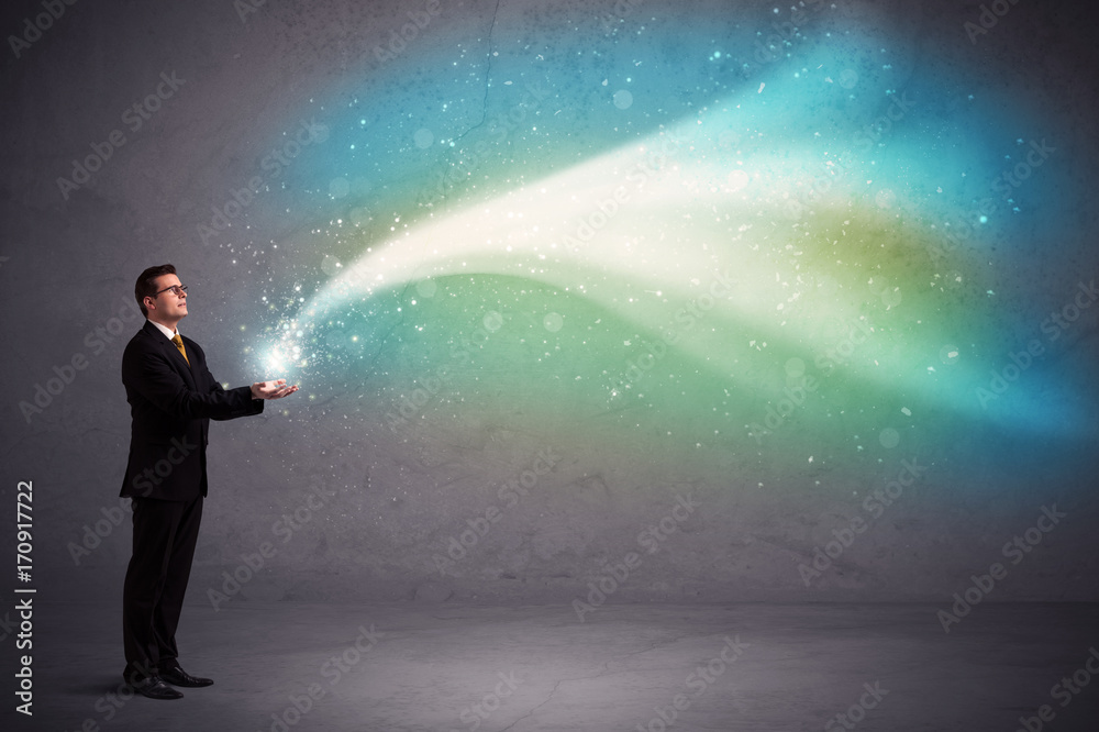 Businessman holding light