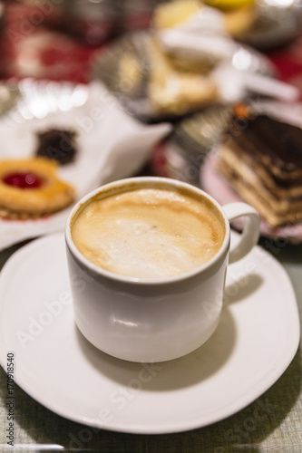 A cup of Cappuccino at cafe in winter in Darjeeling, India.
