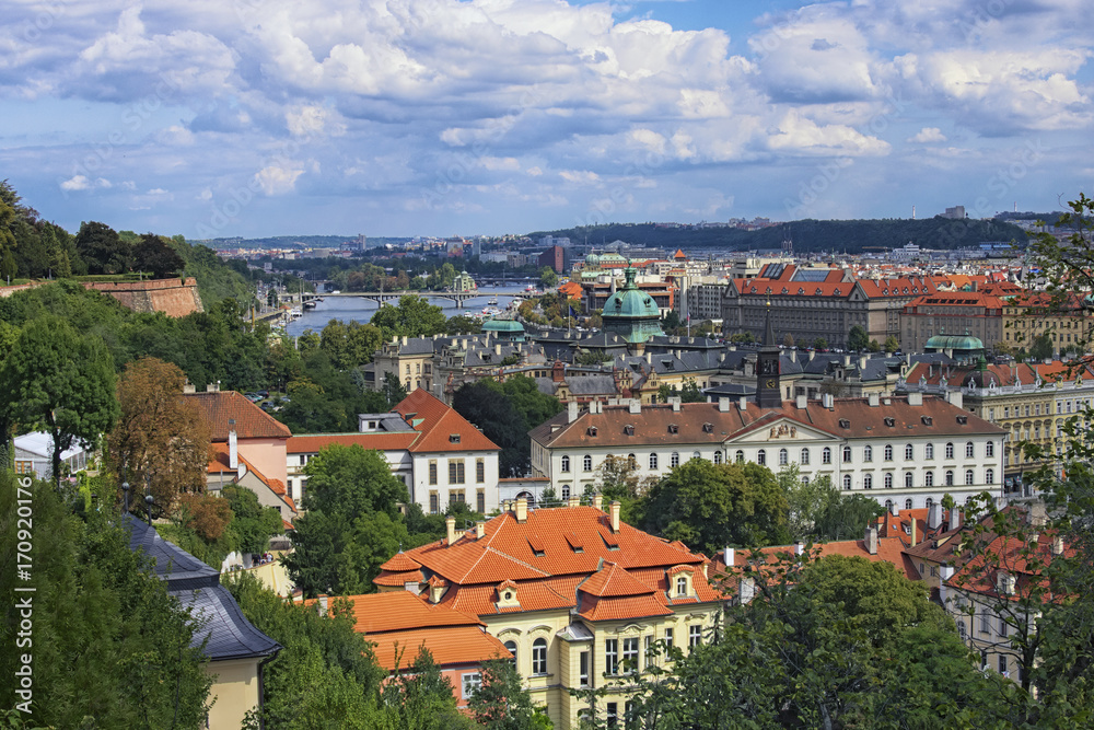 Aerial panoramic view of the center of Prague, Czech Republic. Red tiled roofs and colorful facades of landmarks