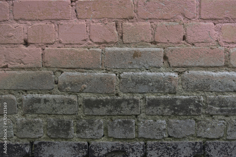 Fototapeta premium Old bare surface of a brick wall
