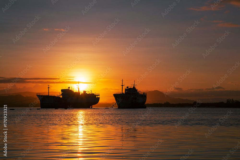 big transport boats in the morning sunrise.