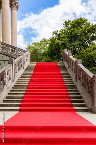 Red carpet on a stairway photo