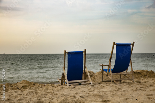 Fototapeta Naklejka Na Ścianę i Meble -  Summers last beach chairs