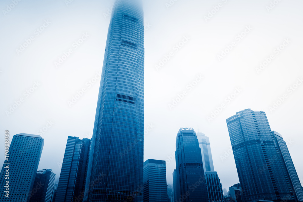Obraz premium Two international finance center,blue toned,Hong Kong,China.