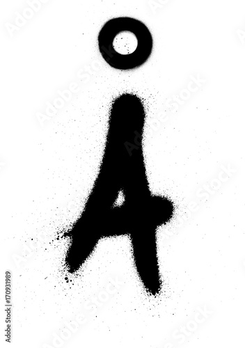 sprayed Scandinavian graffiti vowel font in black over white