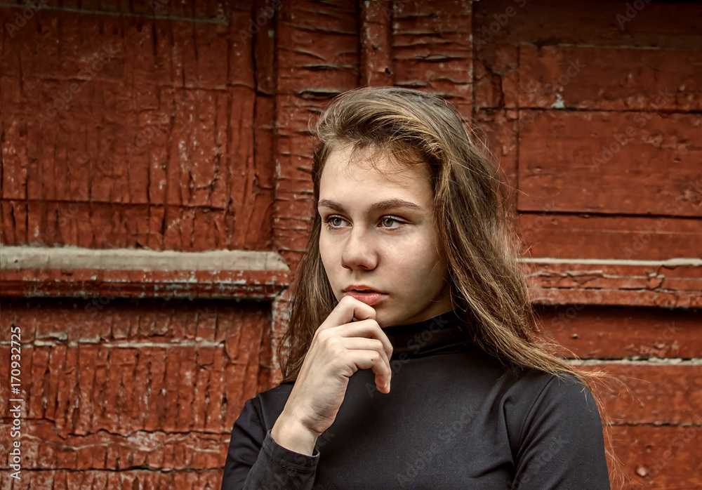 Wight girl standing on street and thinking