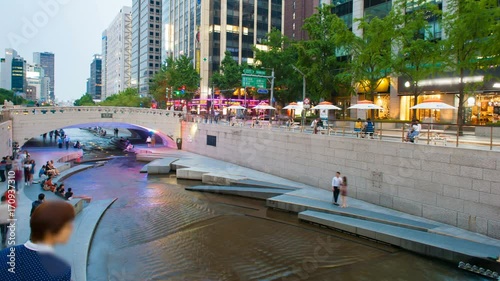 Cheonggyecheon Stream Park with crowd in Seoul City, South Korea. 4K Timelapse photo