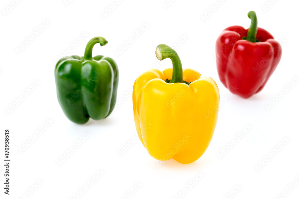 yellow green and red pepper on white background yellow green and red pepper on white background
