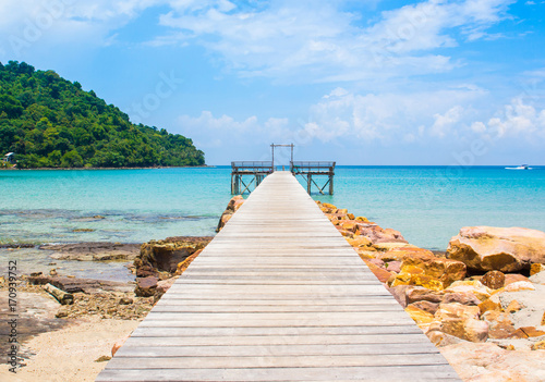 Blue sea with wooden bridge in Koh Kood Thailand.