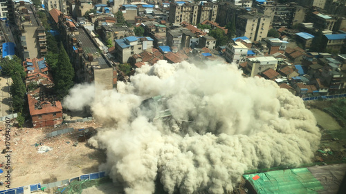 Fotografie, Obraz Downtown building demolition by implosion