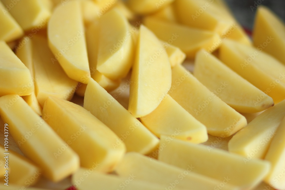 Raw cut potatoes before cooking for designer Raw cut potatoes before cooking for designer