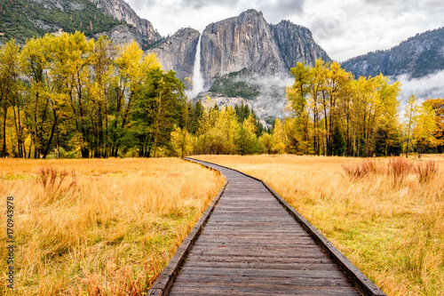 Meadow with boardwalk in Yosemite National Park Valley at autumn photo