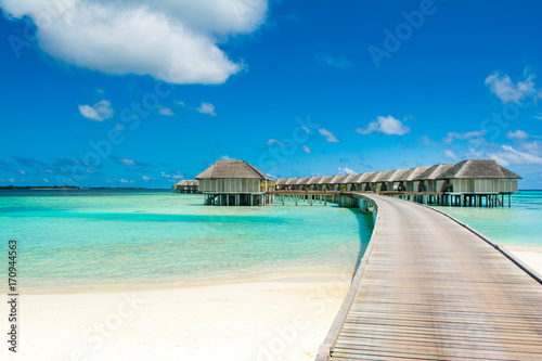 Wooden villas over water of the Indian Ocean, Maldives