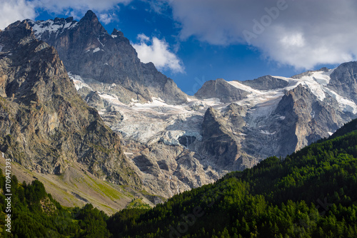 The Meije Peak in summer with the Meije Glacier and Rateau Glacier view from the village of La Grave. Ecrins National Park, Hautes-Alpes, Southern French Alps, France