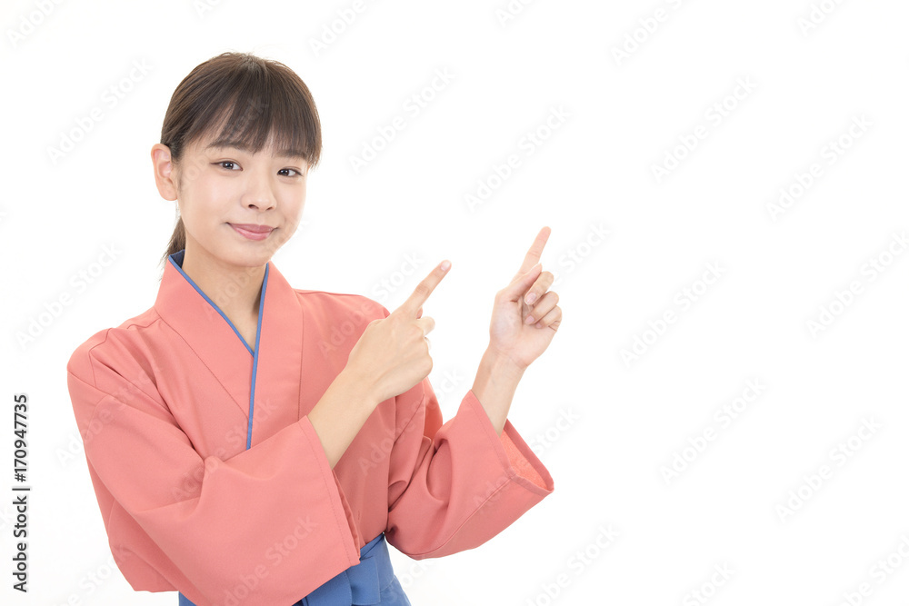 指示する笑顔のウェイトレス 指示する笑顔のウェイトレス