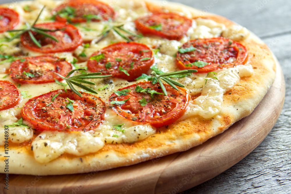 Pizza Margherita with rosemary Pizza Margherita with rosemary