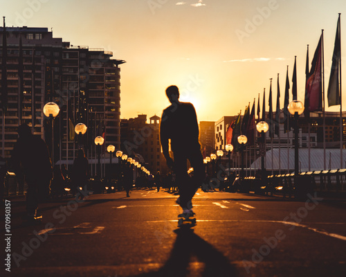 Photography Skateboarder sillhoute riding into the sunset
