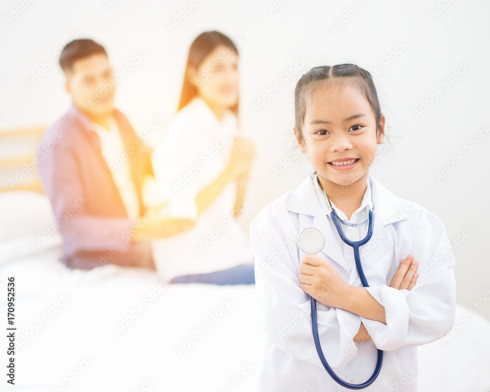 Little doctor, Cute little asian girl dressed like a doctor at home Little doctor, Cute little asian girl dressed like a doctor at home