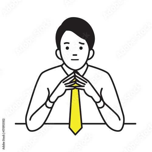 Businessman with steepled hands