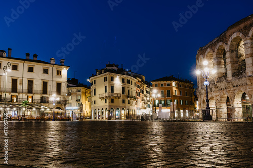 Piazza Bra and Ancient Roman Amphitheater in Verona Italy photo
