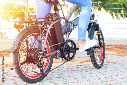 Women with electric e bike With lake view