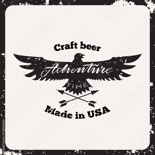 Vintage label with textured eagle, arrows and lettering - adwenture time. Craft beer retro label. Isolated on shabby background. photo