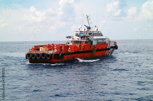Supply boat transfer cargo to oil and gas industry and moving cargo from the boat to the platform