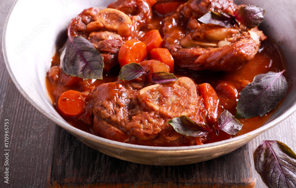 Osso buco (braised veal shank) with vegetables Osso buco (braised veal shank) with vegetables