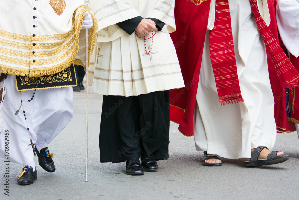 detail of the trditional dresses of christian confraternity members