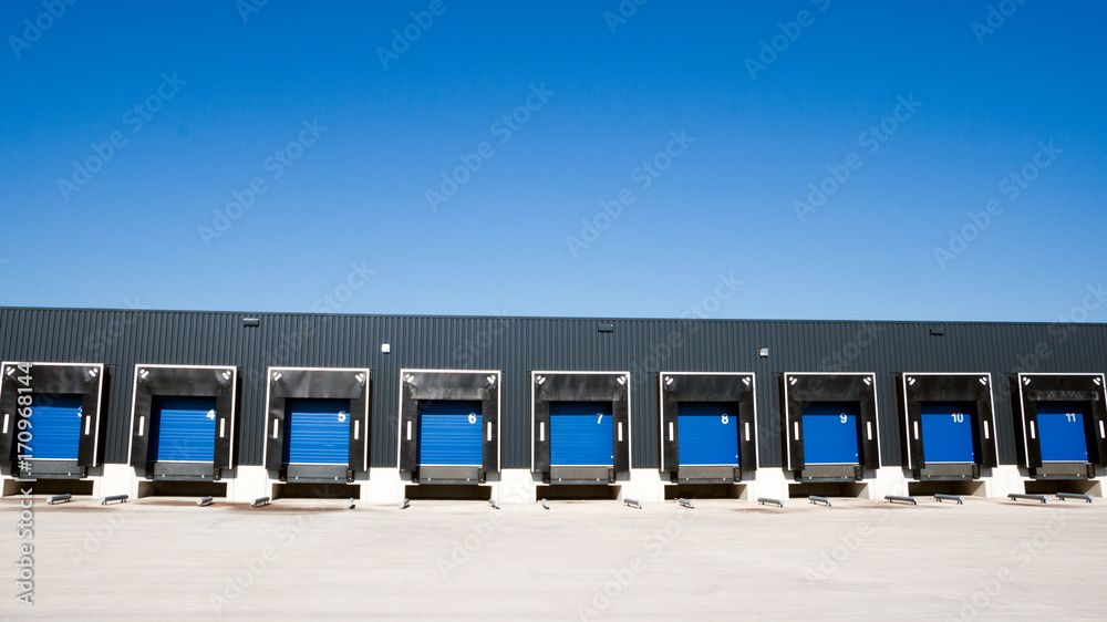 row of loading docks with shutter doors