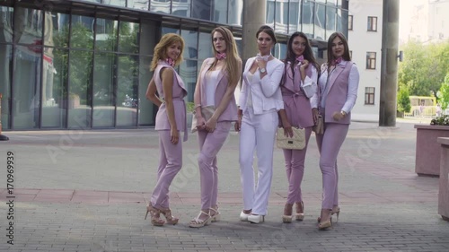 Portrait of five business women outdoors photo