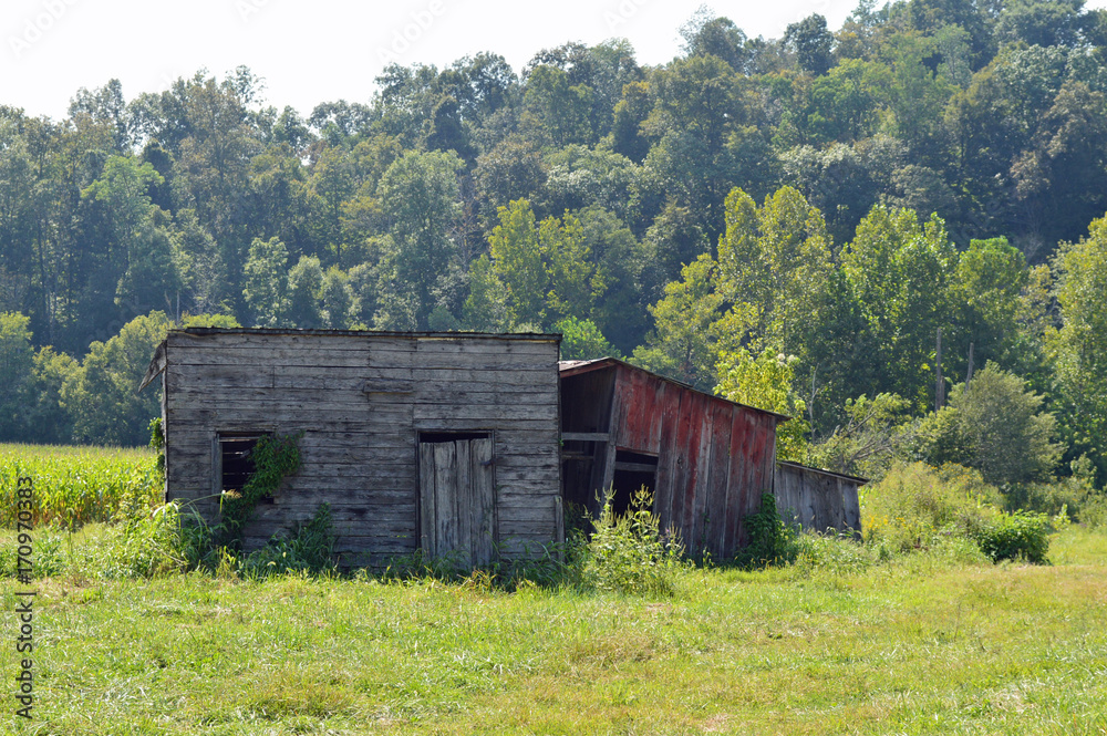 Photo of an old abandoned building on the farm in the country Photo of an old abandoned building on the farm in the country